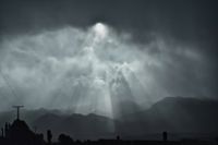 Light rain and clouds over the fjords of New Zealand, South Island, Fiordland, Southland